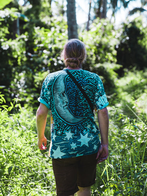 Green t-shirt with The Band graphic